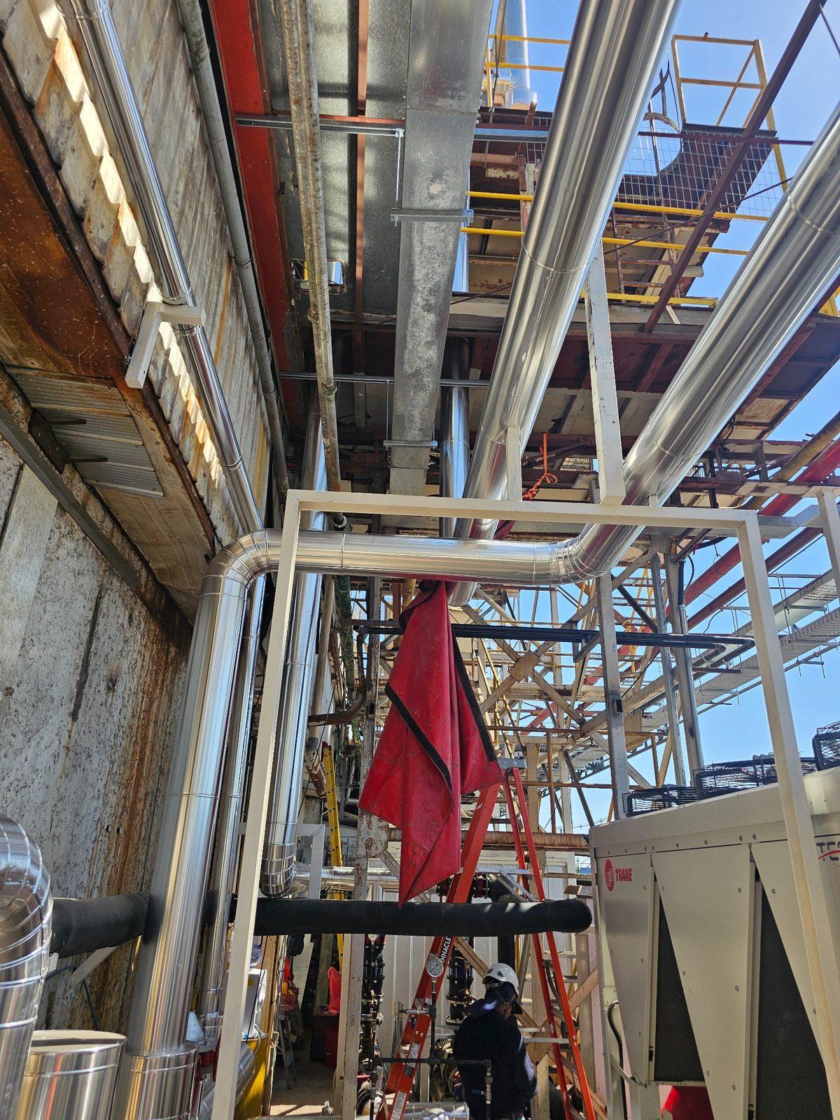 Trabajo industrial de aislación térmica CYC CreAccion